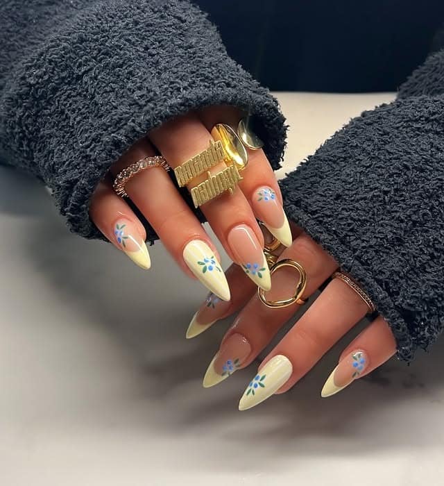 20. Pastel Yellow Blue Floral French Stiletto Nails - yellow nail ideas
