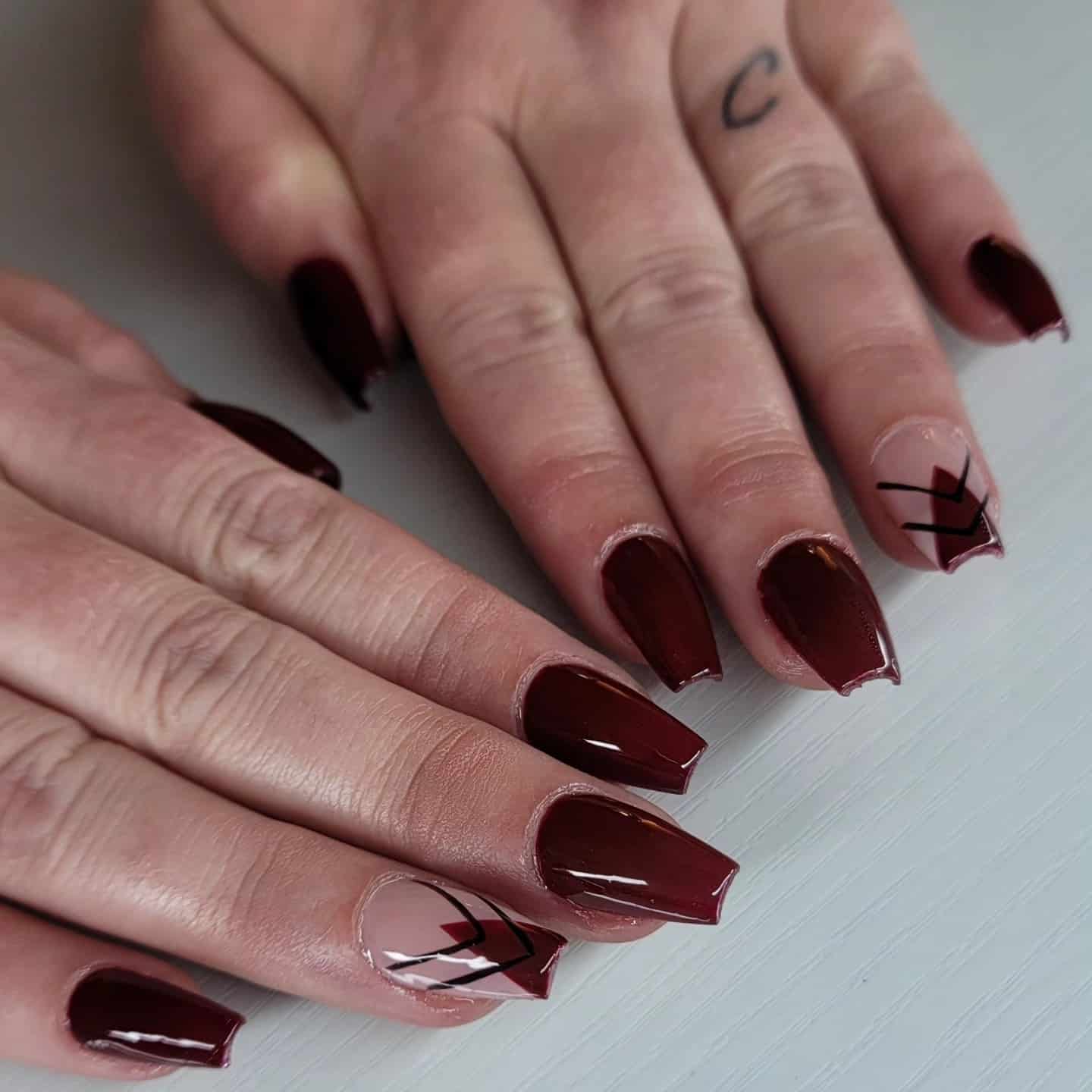 9. Dark Red Geometric Accent Coffin Nails - dark red coffin nail ideas