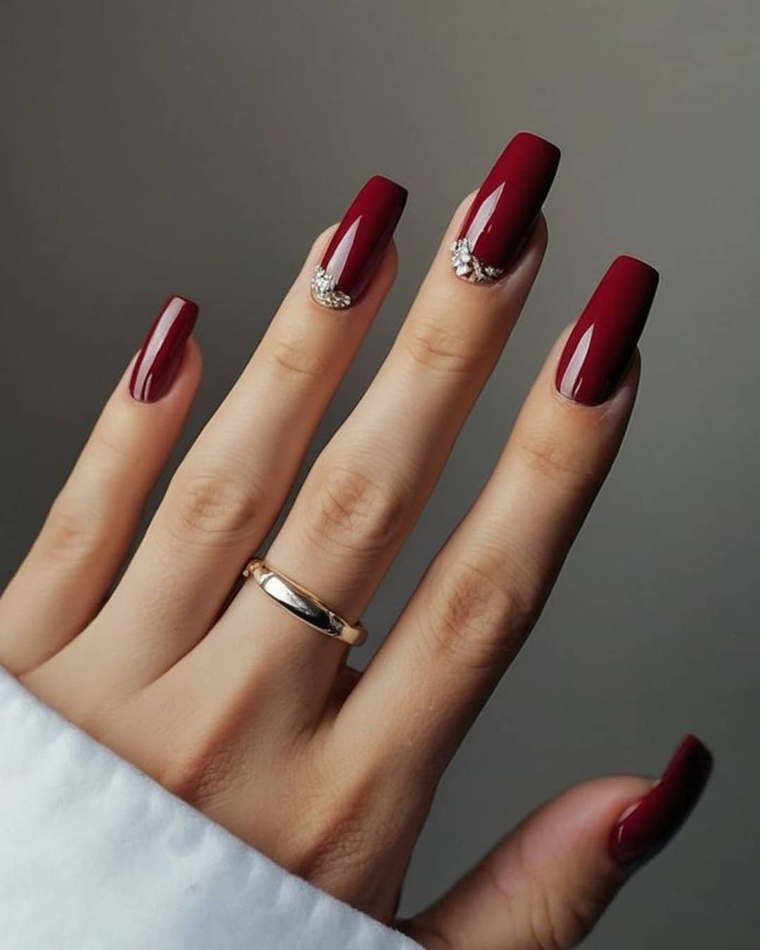 14. Ombre Dark Red Coffin Nails with Crystal Accents - dark red coffin nail ideas