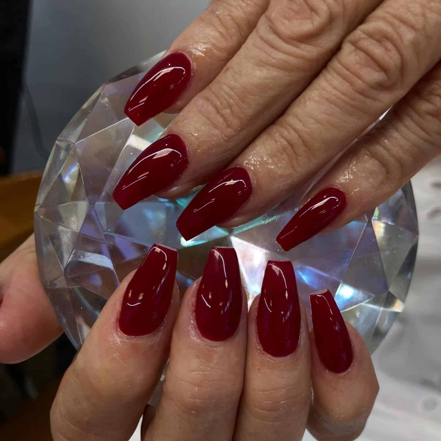19. Classic Ruby Red Coffin Nails - dark red coffin nail ideas