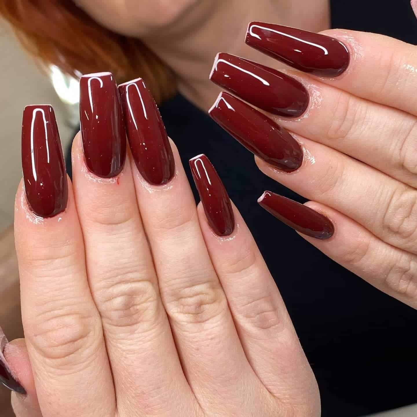 21. Glossy Dark Mahogany Coffin Nails - dark red coffin nail ideas