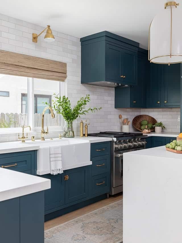7. Deep Teal Blue Kitchen Cabinets with Brass Hardware - blue kitchen cabinets ideas