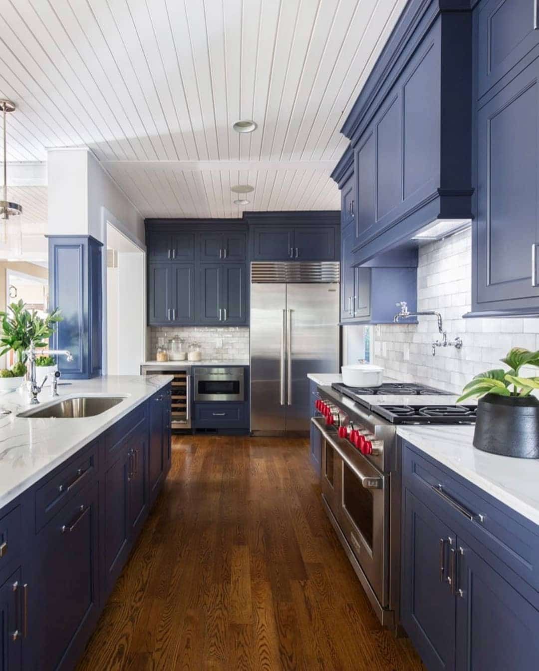 18. Indigo Blue Kitchen Cabinets with Professional-Grade Appliances - blue kitchen cabinets ideas