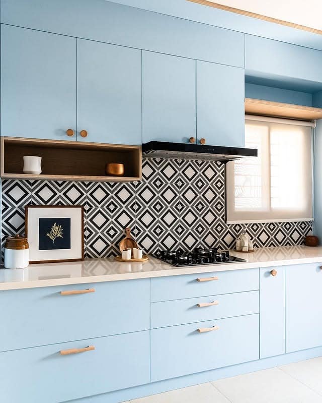 19. Pale Blue Kitchen Cabinets with Geometric Statement Backsplash - blue kitchen cabinets ideas