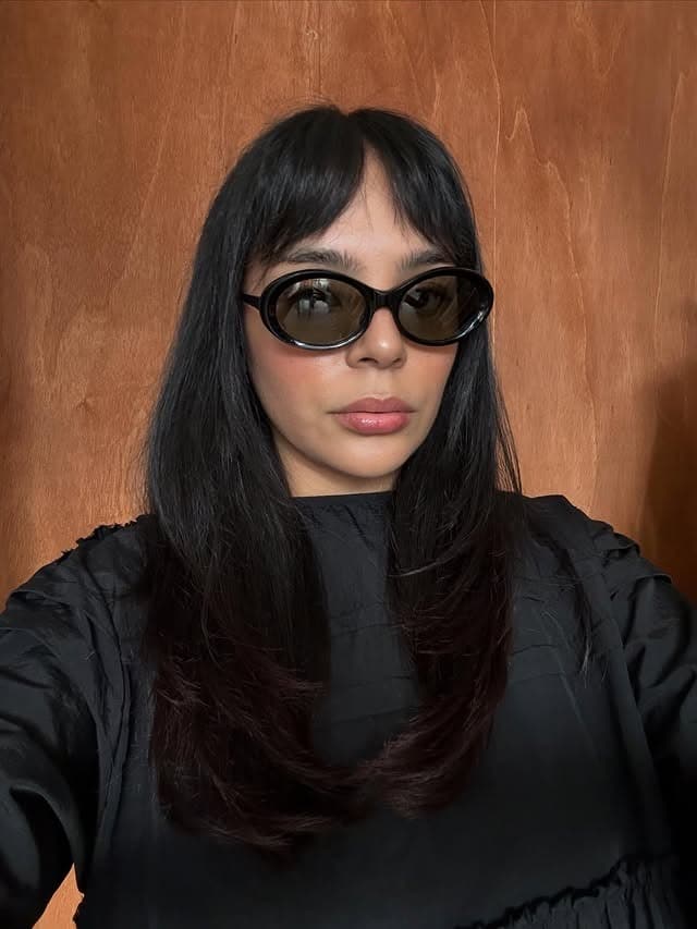 6. Jet Black Layered Cut with Wispy Split Bangs - Wispy Bangs For Thin Hair