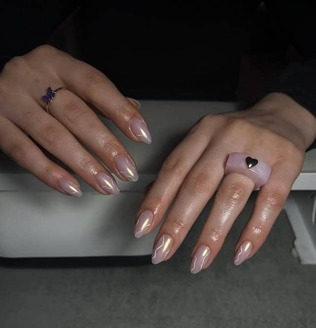 1. Lilac Chrome Swirl Almond Nails - chrome nail ideas