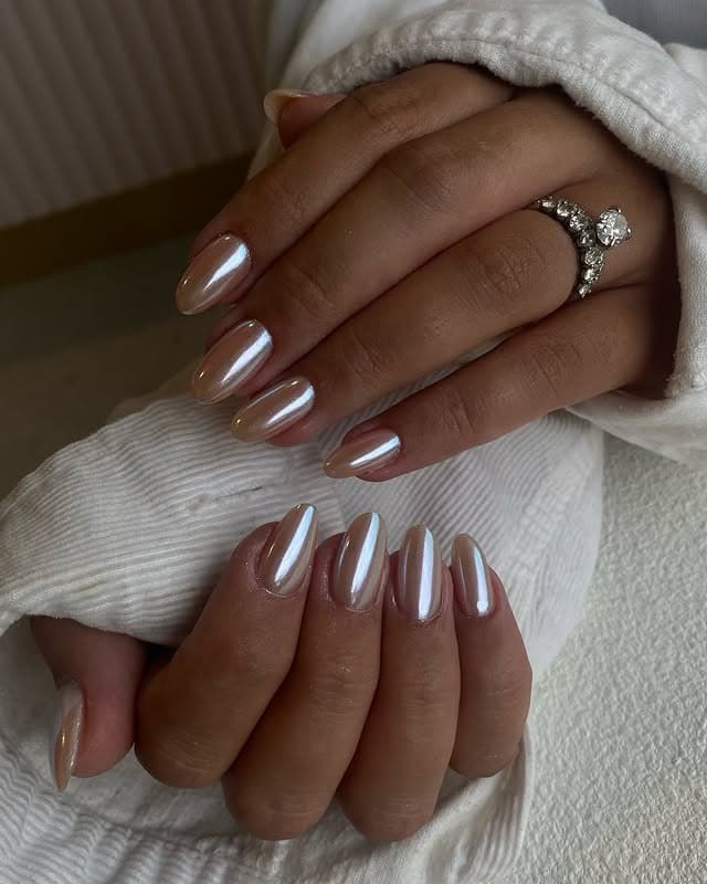 22. Champagne Mirror Chrome Almond Nails - chrome nail ideas