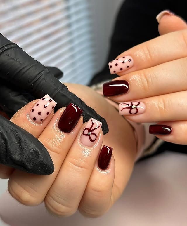 15. Burgundy Bow and Polka Dot Nails on a Nude Base - cute short nail ideas