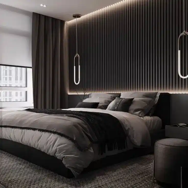 5. Dark Gray Bedroom with Vertical Paneling and Ambient Lighting - dark bedroom ideas