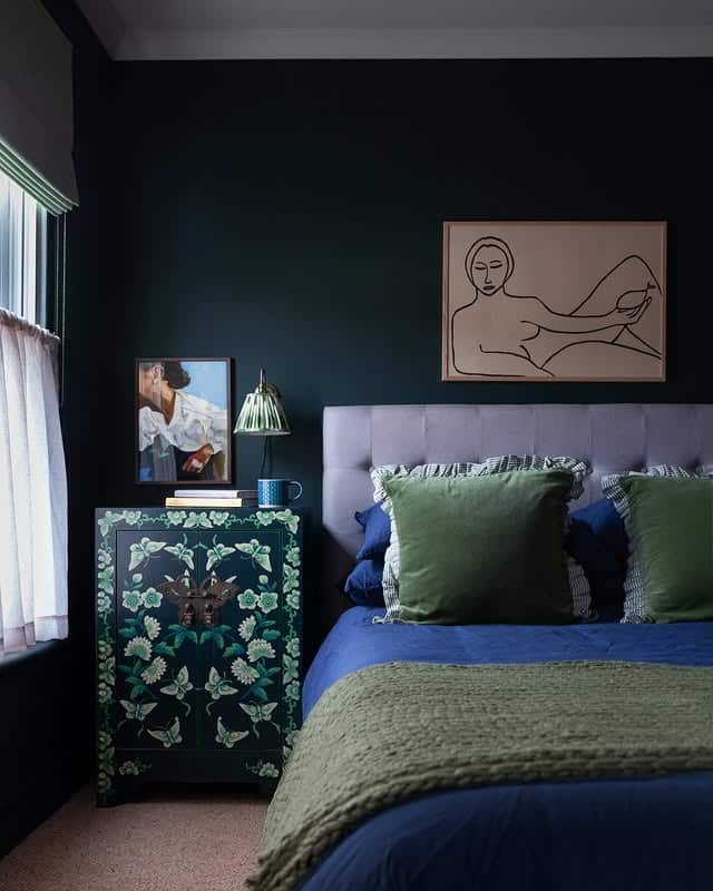 7. Midnight Blue Bedroom with Botanical Green Accents - dark bedroom ideas