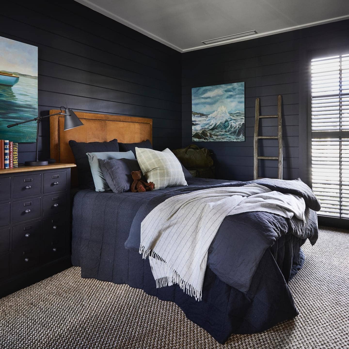 10. Navy Blue Bedroom with Warm Leather Headboard - dark bedroom ideas