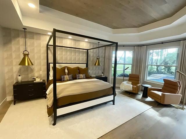 17. Mocha Brown and Black Canopy Primary Bedroom - primary bedroom ideas