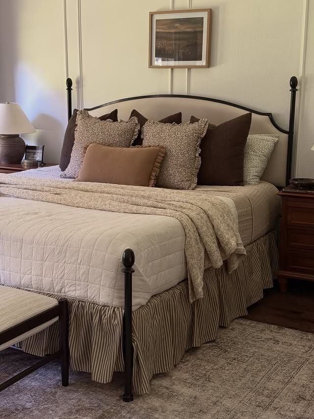 20. Chocolate Brown and Beige Classic Iron Bed Bedroom - primary bedroom ideas