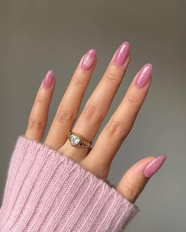 7. Full Coverage Pink Glitter Almond Nails - glitter nail ideas
