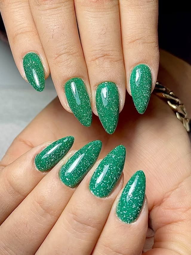 10. Emerald Green Fine Glitter Almond Nails - glitter nail ideas