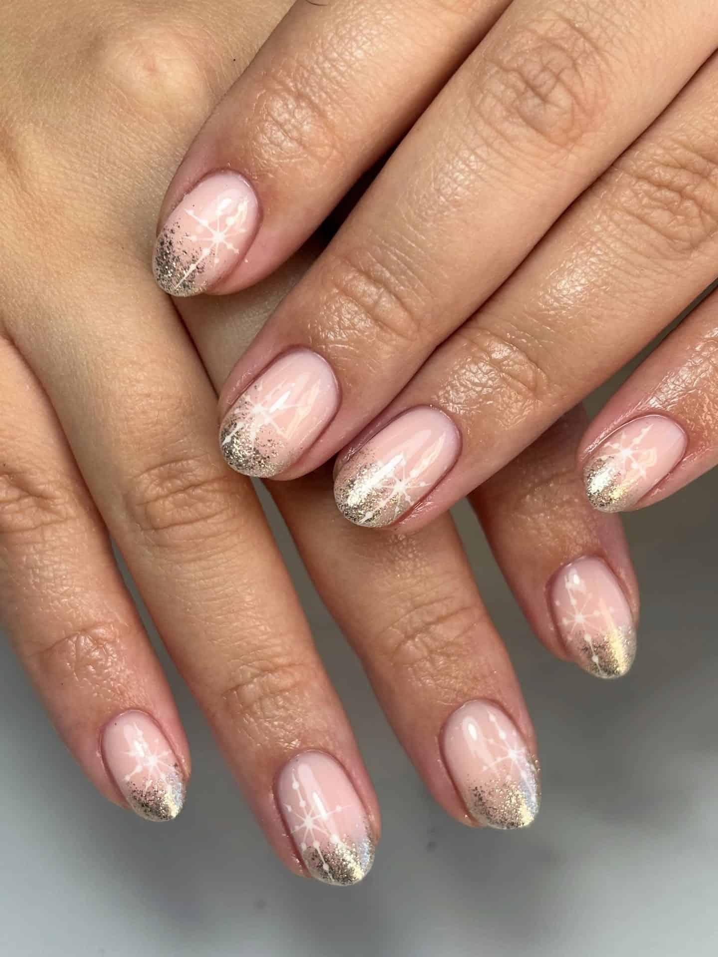 21. Soft Pink Silver Glitter French Short Nails with Snowflake Art - glitter nail ideas