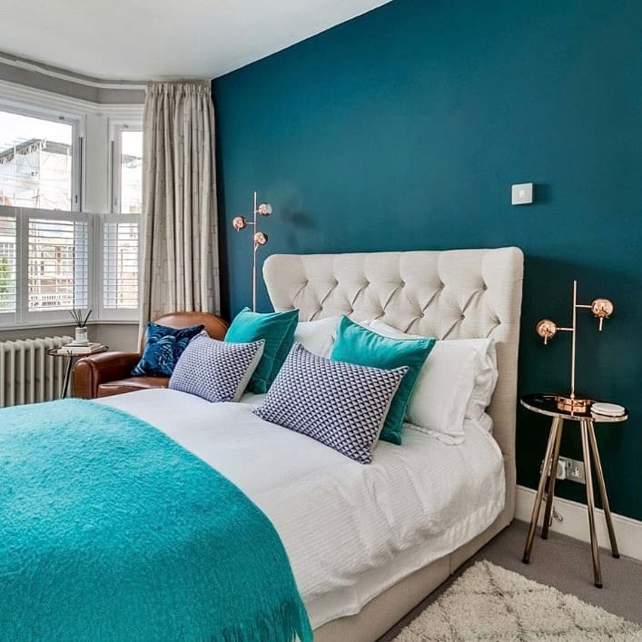 2. Teal Accent Wall With Rose Gold Details - teal bedroom ideas