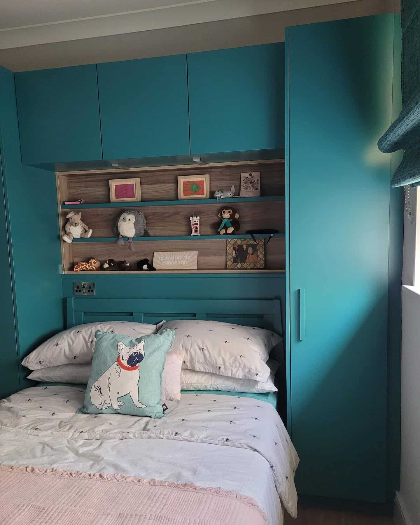 5. Modern Teal Built-In Bedroom Storage - teal bedroom ideas