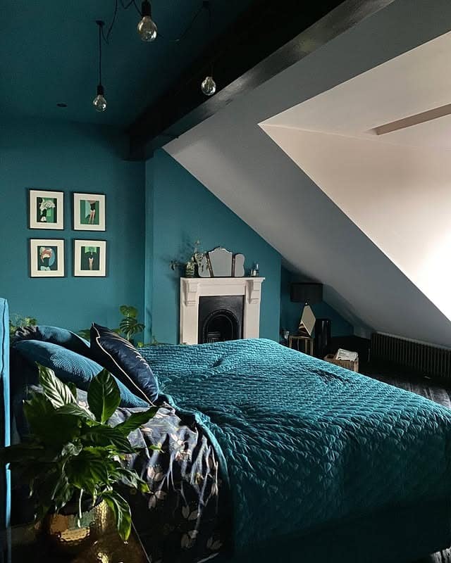 13. Moody Teal Attic Bedroom With Dark Accents - teal bedroom ideas