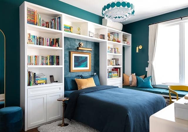 18. Teal Reading Nook Bedroom With Built-In Shelving - teal bedroom ideas
