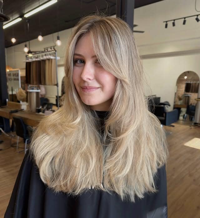 2. Champagne Blonde Butterfly Layers - Champagne Blonde Hair Color