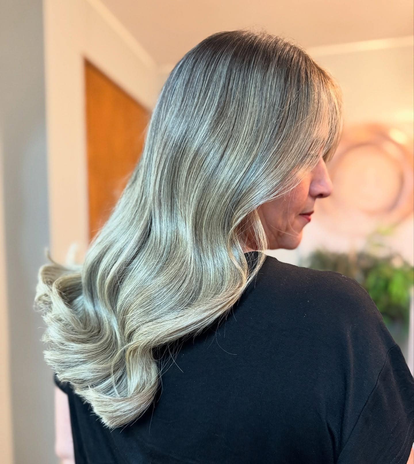 5. Smoky Champagne Blonde Blowout - Champagne Blonde Hair Color