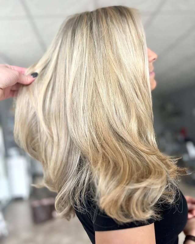 7. Champagne Blonde Lob with Soft Layers - Champagne Blonde Hair Color