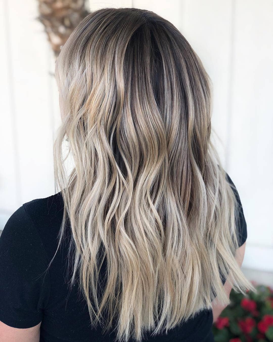10. Textured Champagne Blonde Beach Waves - Champagne Blonde Hair Color