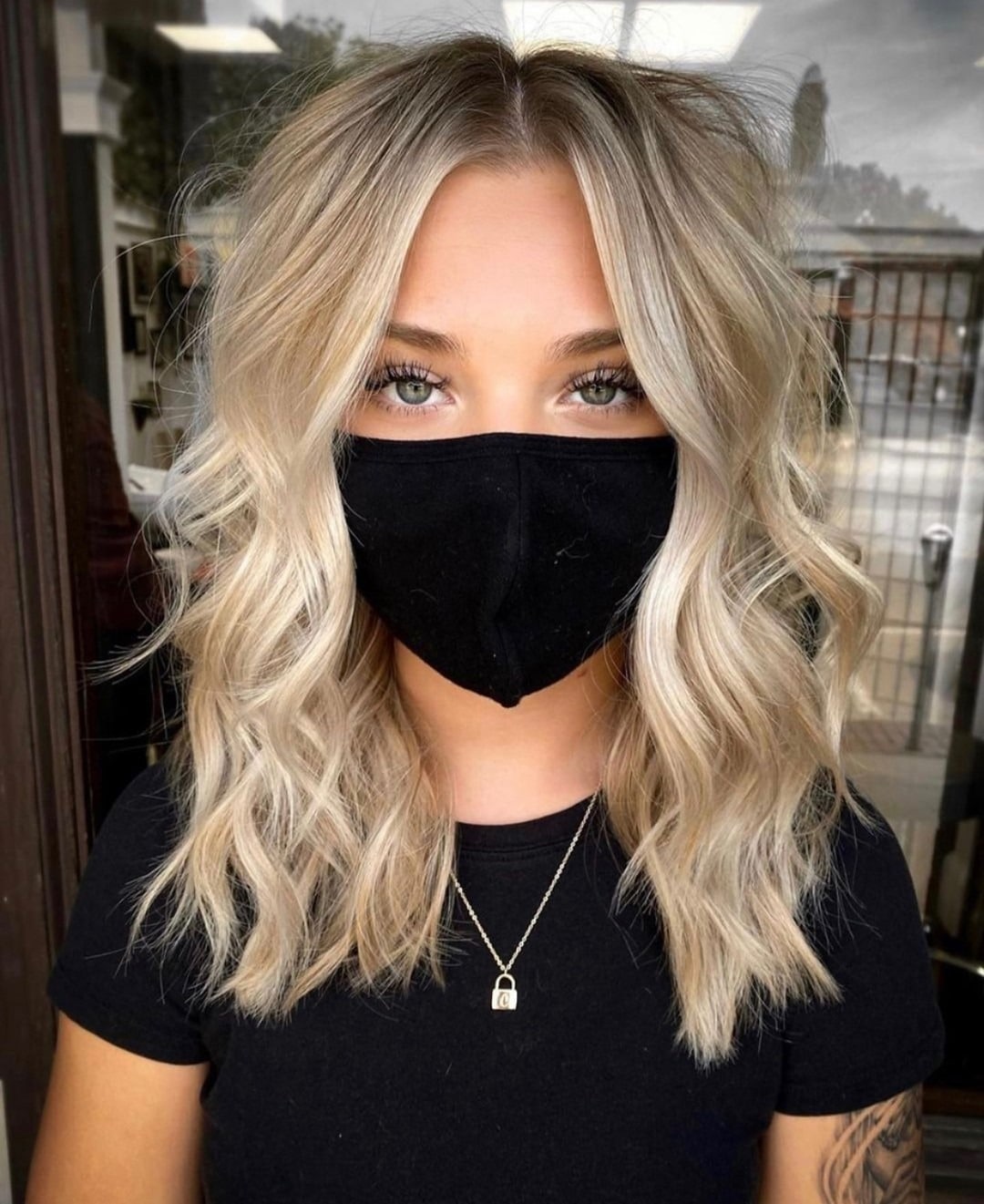 16. Champagne Blonde Curtain Bob - Champagne Blonde Hair Color
