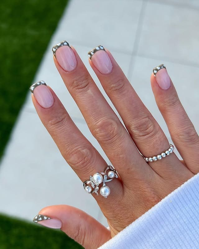 2. Soft Pink Short Nails with Chrome French Tips - short nail art ideas