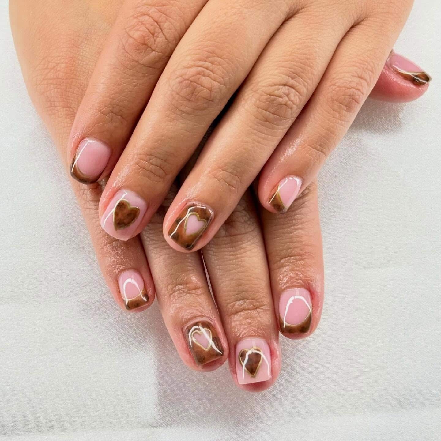 3. Mocha Heart French Short Nails - short nail art ideas