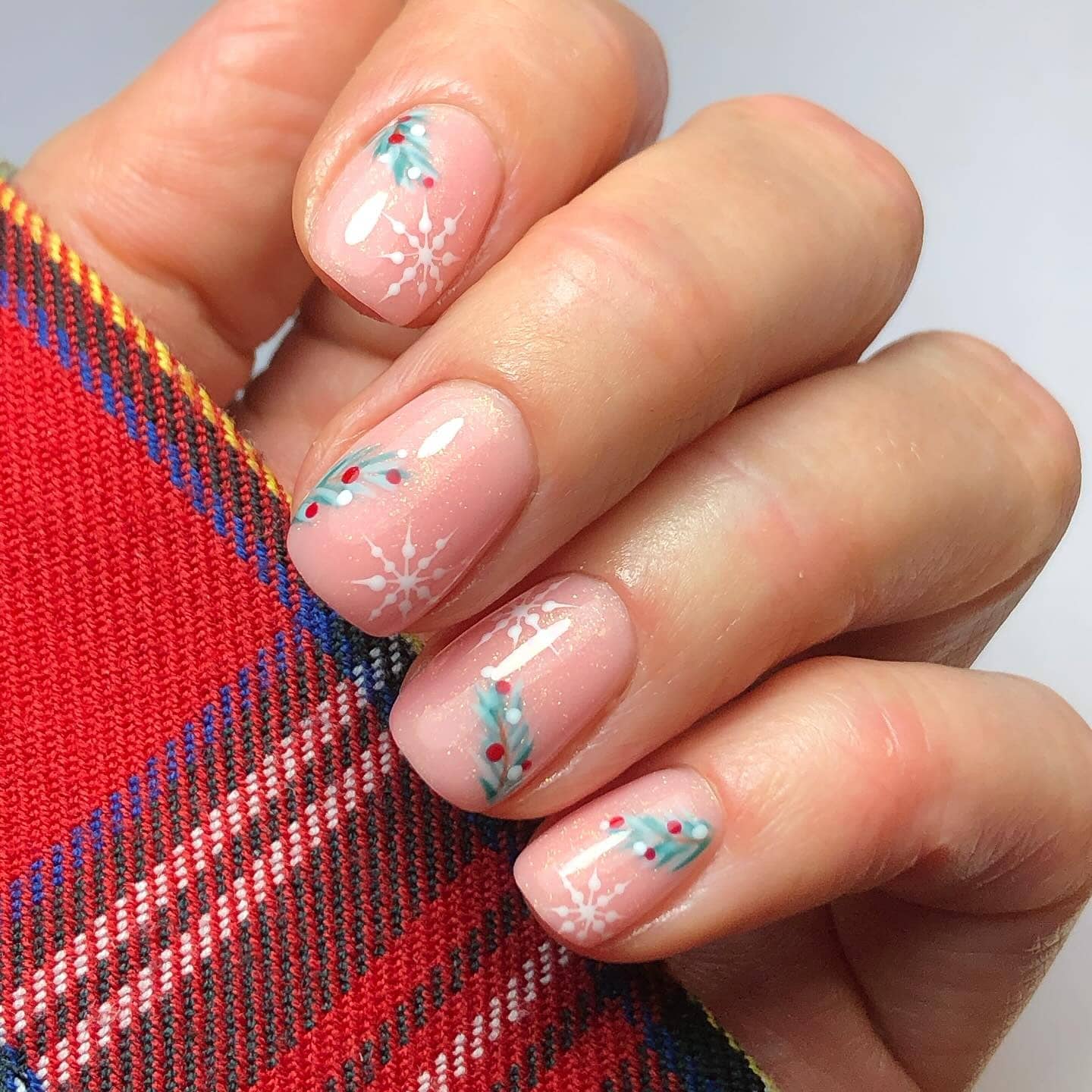 7. Winter Snowflake Short Nails in Blush Pink - short nail art ideas