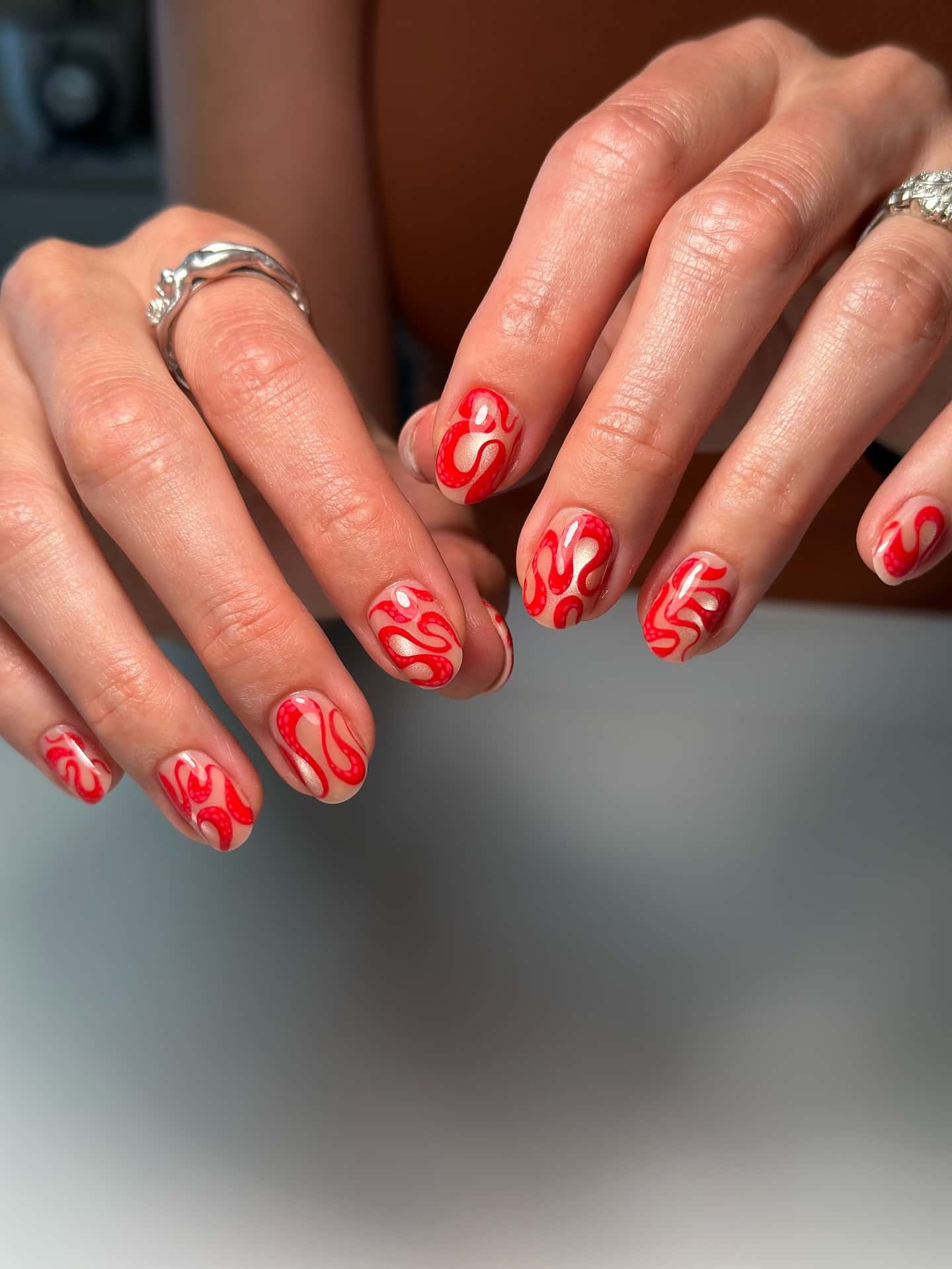 11. Abstract Flame Short Nails in Cherry Red & Nude - short nail art ideas