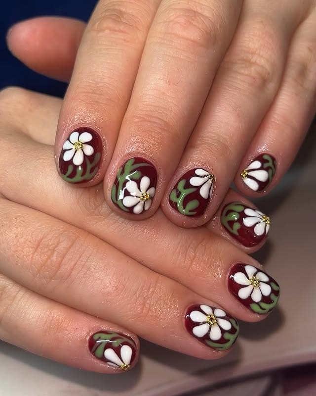 13. Burgundy Daisy Short Nails with Olive Green Accents - short nail art ideas