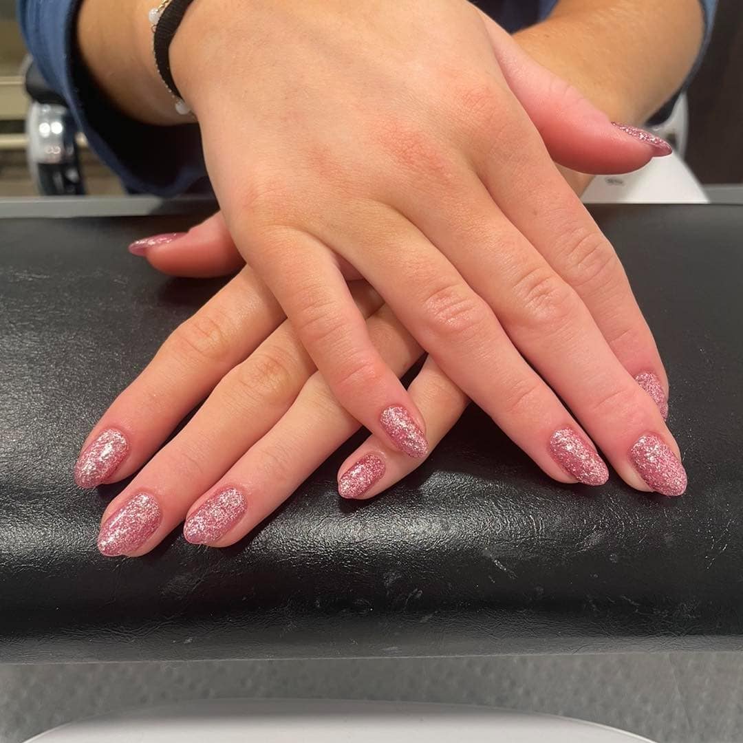 19. Pink Glitter Almond Nails - thanksgiving nail ideas