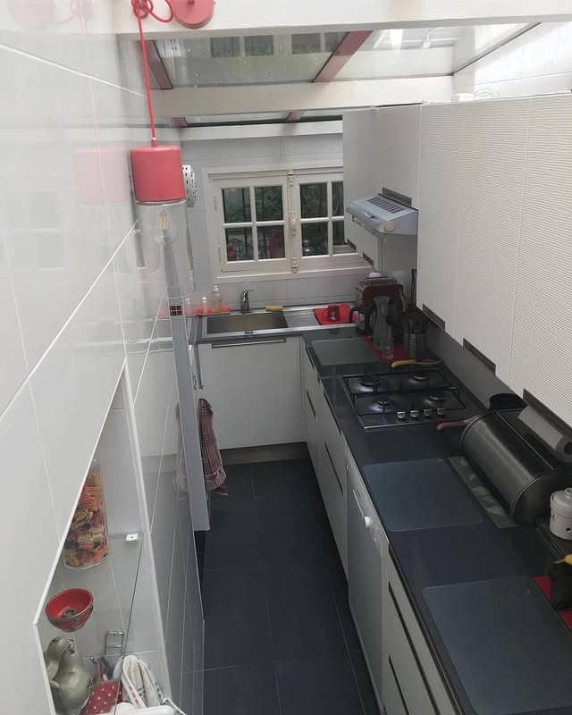 2. Modern White Galley Kitchen with Charcoal Countertops - tiny kitchen ideas