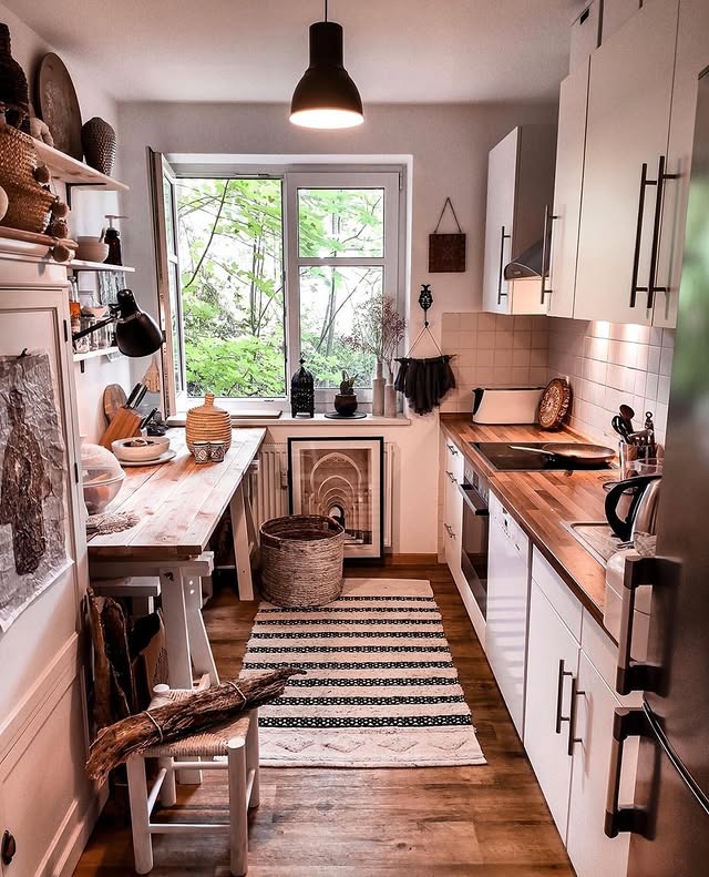 7. Cozy Narrow Kitchen with Rustic Wood Workstation - tiny kitchen ideas