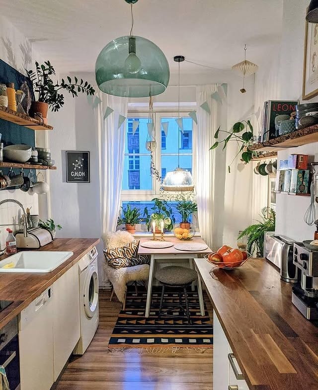 13. White and Walnut Galley Kitchen with Botanical Decor - tiny kitchen ideas