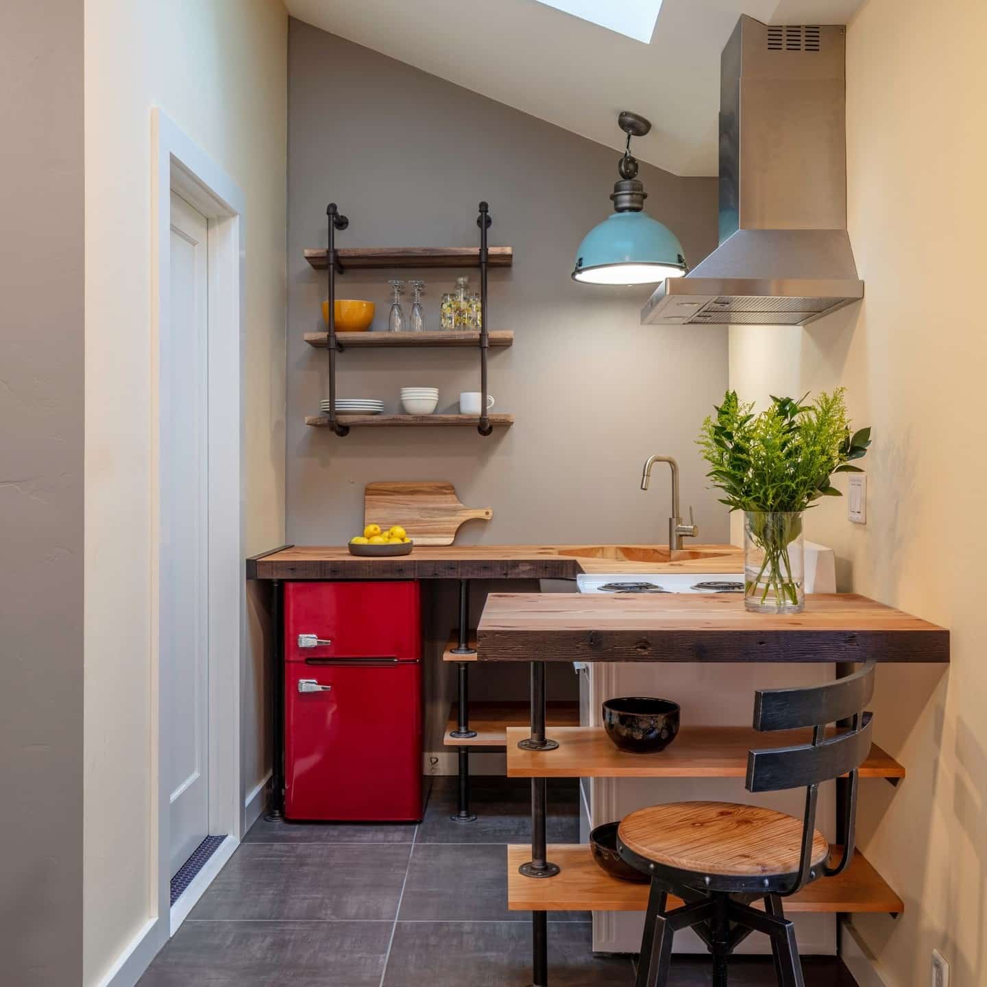 14. Industrial Gray Kitchen with Red Retro Refrigerator - tiny kitchen ideas