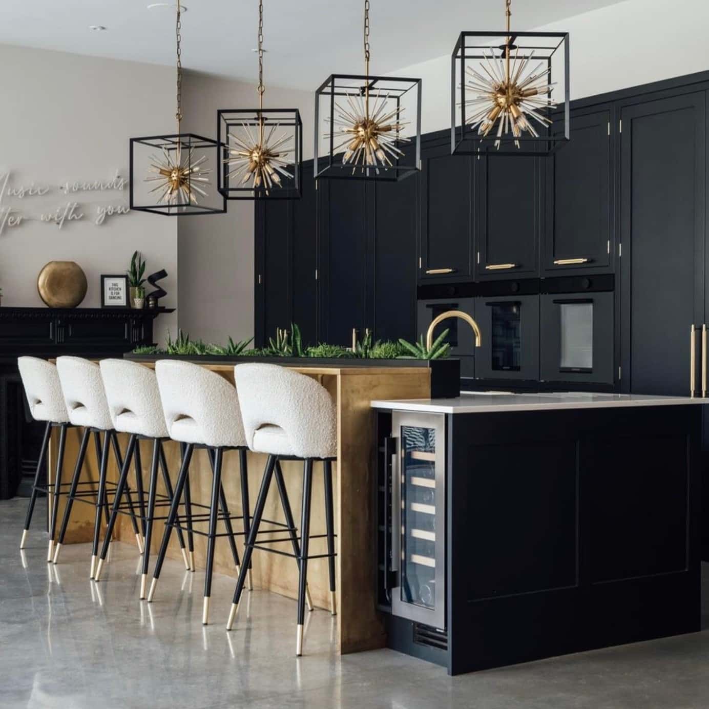 1. Matte Black and Brass Statement Kitchen - dark kitchen ideas