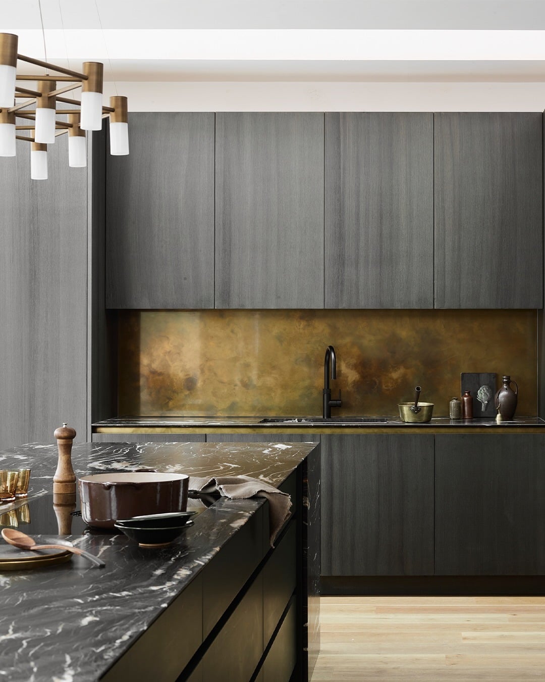 5. Dark Wood and Bronze Luxury Kitchen - dark kitchen ideas