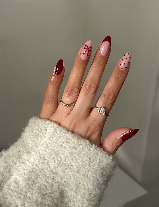 7. Burgundy Bow Accent Nails - burgundy nail ideas