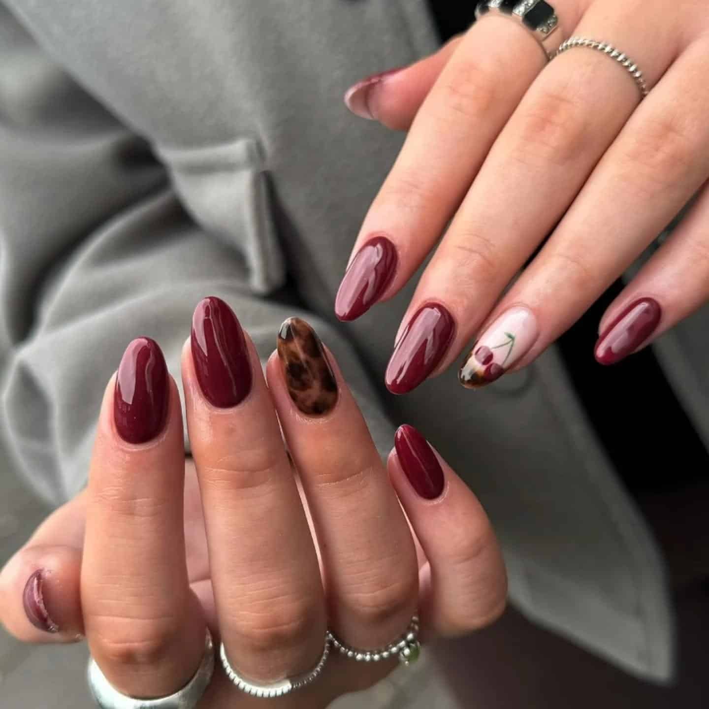 12. Burgundy Cherry Accent Almond Nails - burgundy nail ideas