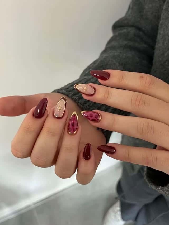 22. Burgundy Mixed Art Almond Nails - burgundy nail ideas