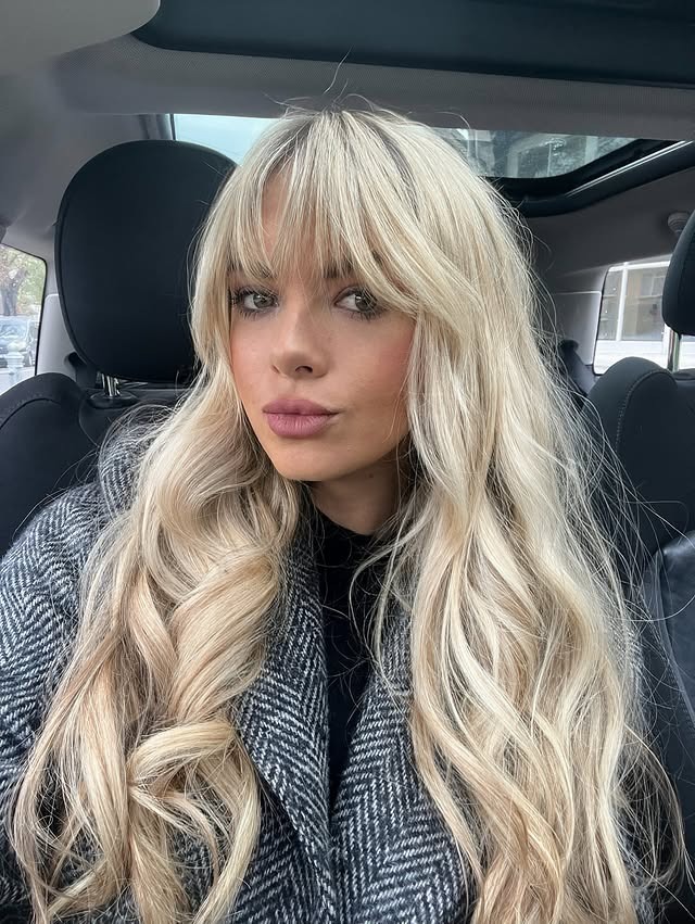 10. Icy Blonde Waves with Wispy Fringe - Long Hair With Wispy Fringe
