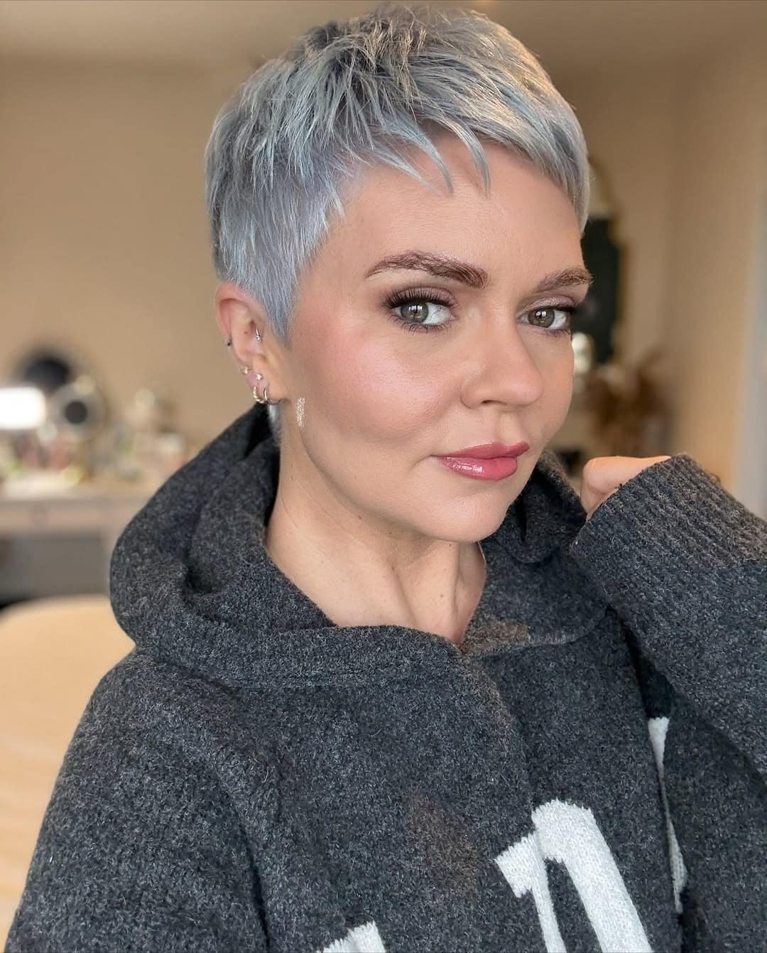 15. Icy Silver Layered Pixie Crop - Short Pixie Haircuts For Women