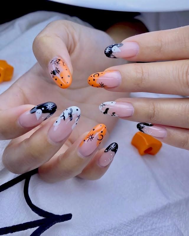 4. Halloween Clear French Almond Nails - clear nail ideas