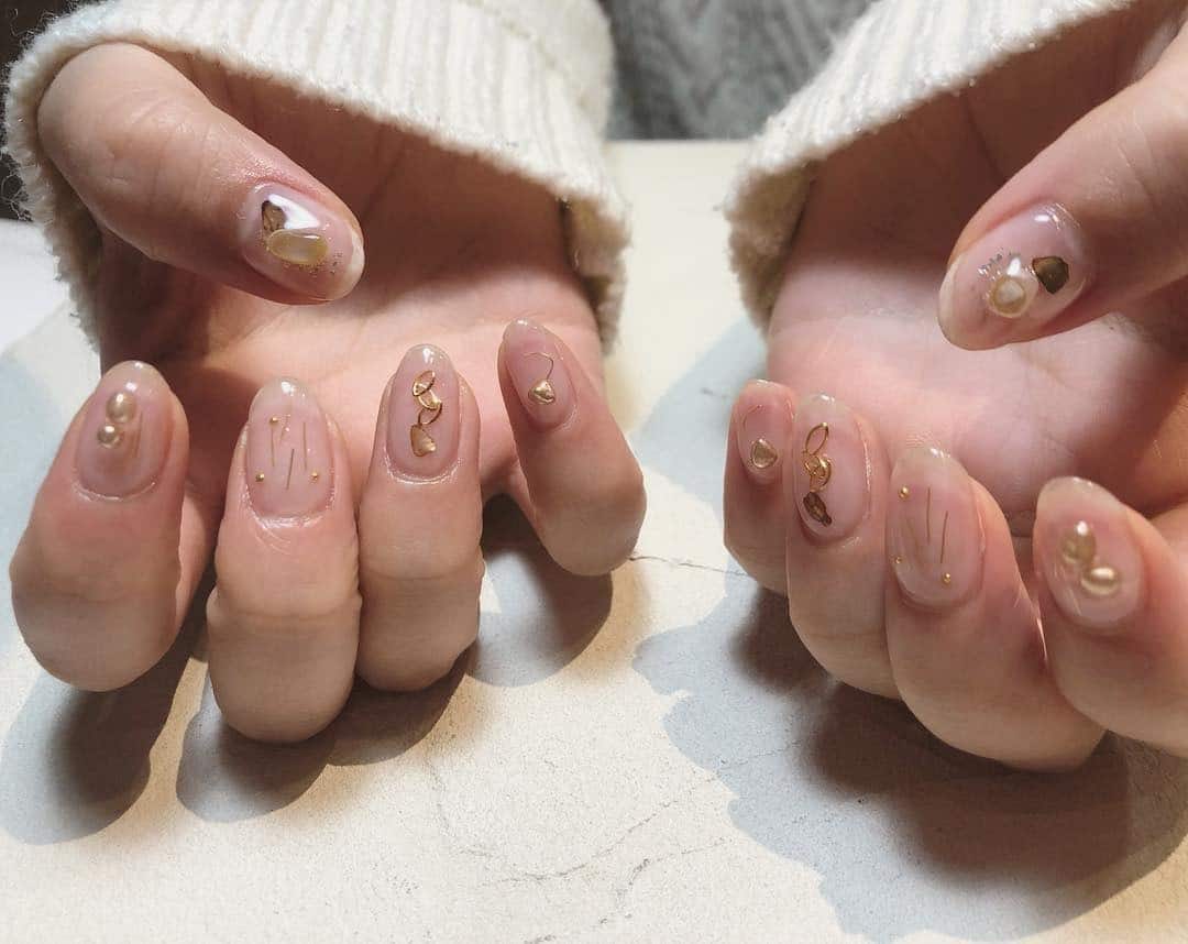 19. Gold Charm Clear Nude Almond Nails - clear nail ideas