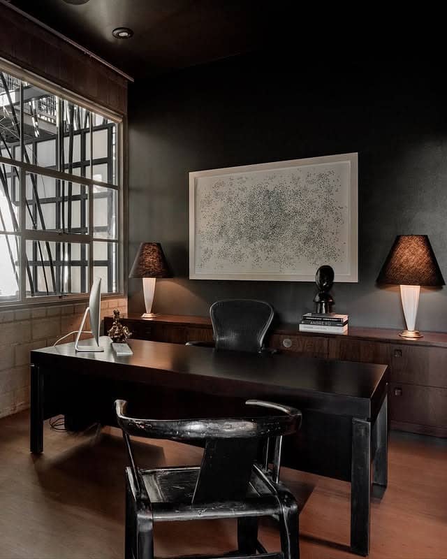 8. Dark Wood Statement Office with Gallery Appeal - office room ideas