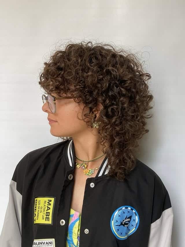8. Curly Chestnut Shag Mullet - Shaggy Haircuts